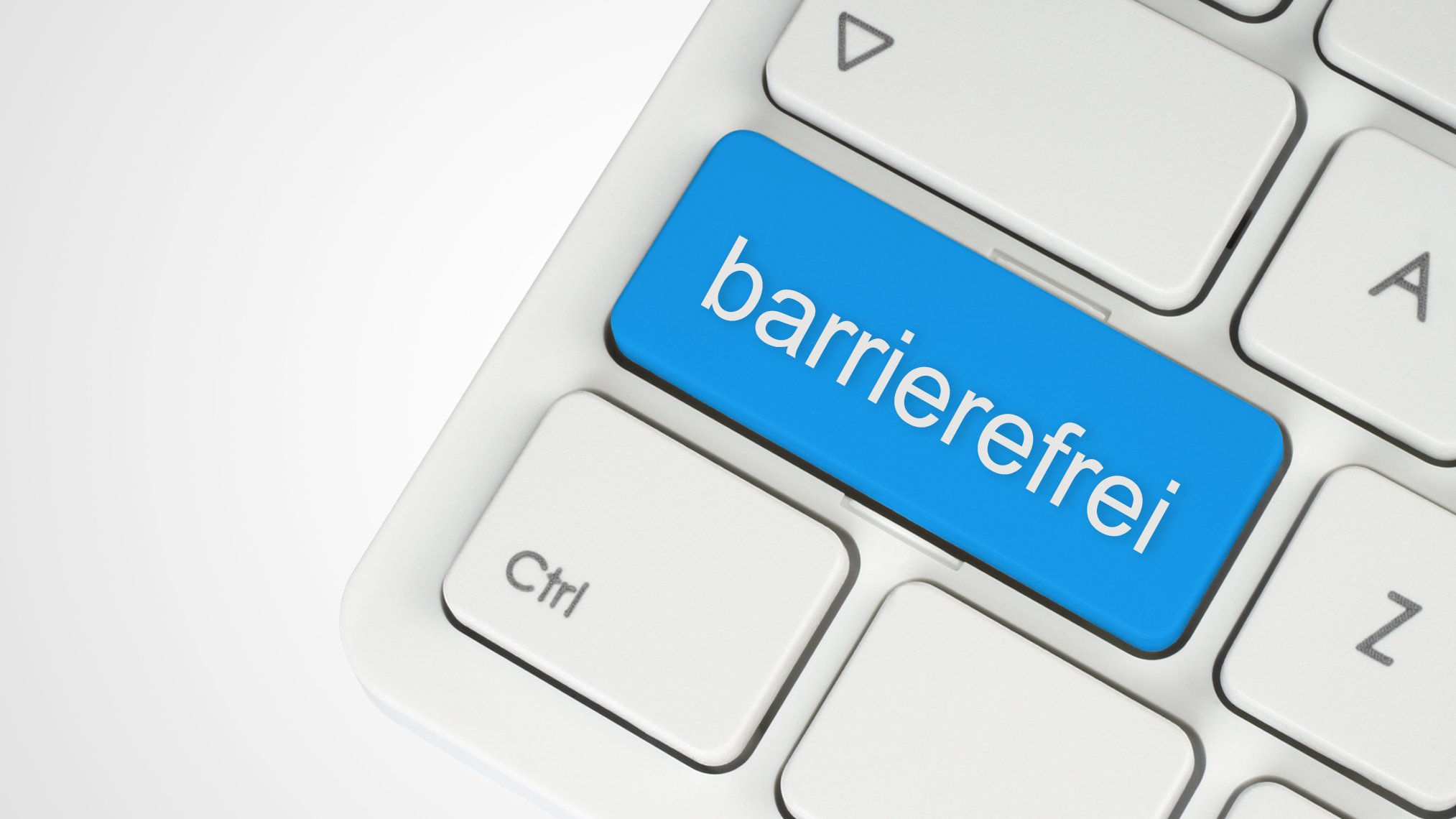 Barrierefreiheit Tastatur mit blauer Taste und der Aufschrift "barrierefrei"