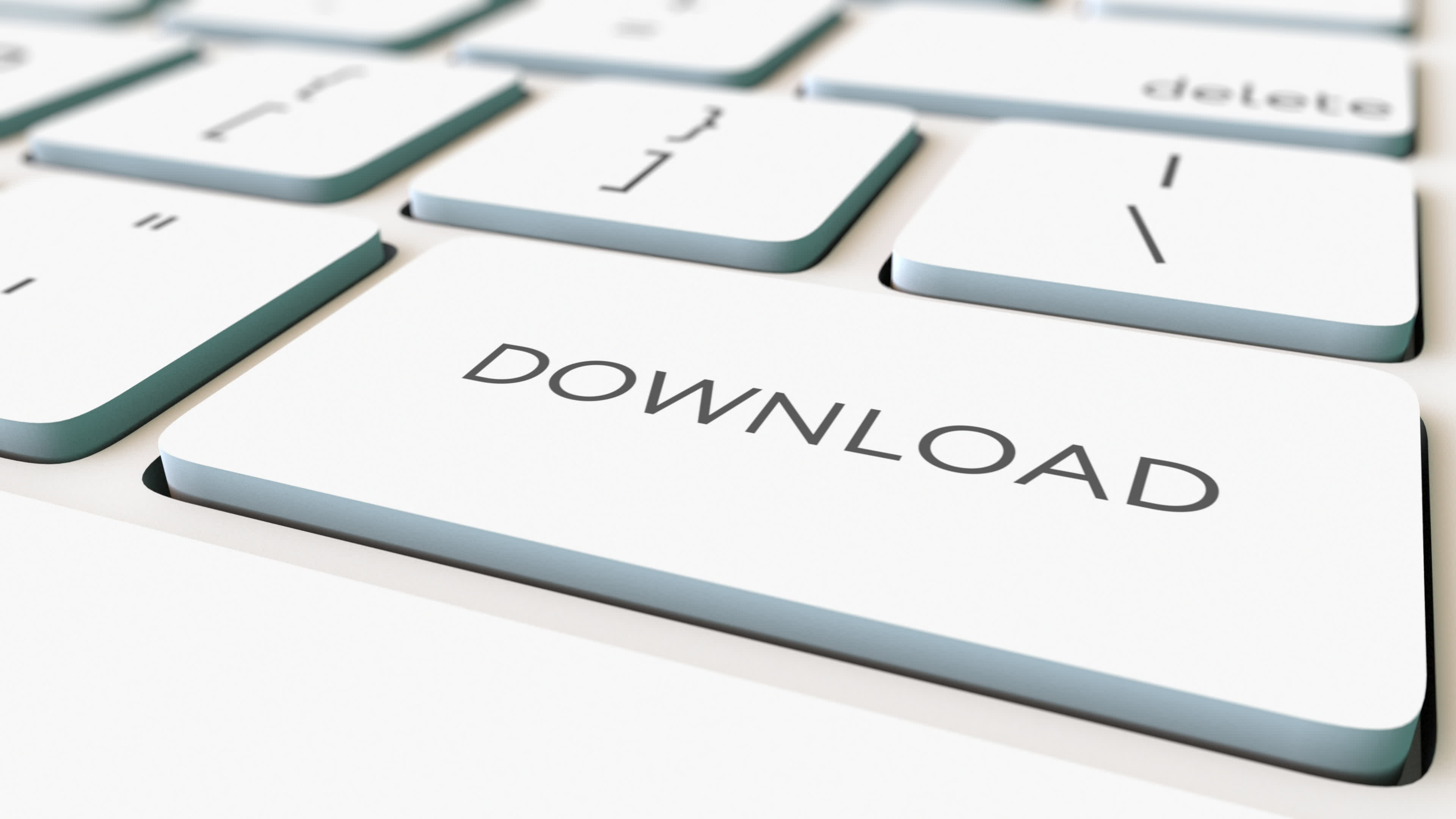Datei-Download Silberne Tastatur mit einer Taste, die die Aufschrift "Download" trägt